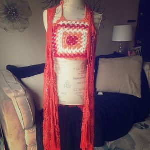 Orange crotchet crop top and vest/duster.